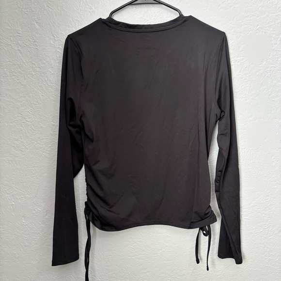 Elegant Black Long Sleeve Top with Side Ties - Picture 9 of 10